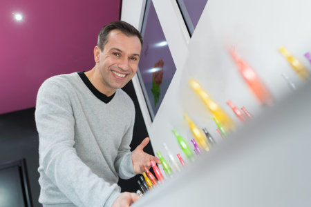 customer choosing e-cigaretteの写真素材