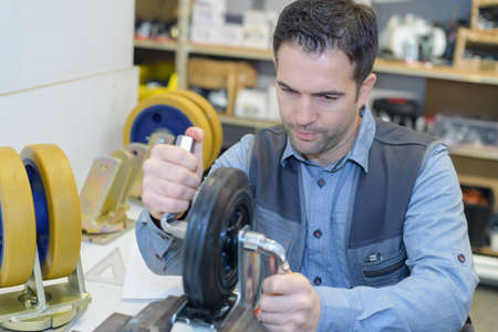 wheel worker in his workshopの写真素材