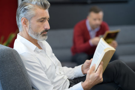 men studying a script for the auditionの写真素材