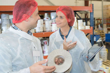 workers working at a food factoryの写真素材