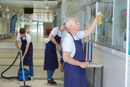 group of cleanners a in corridorの写真素材