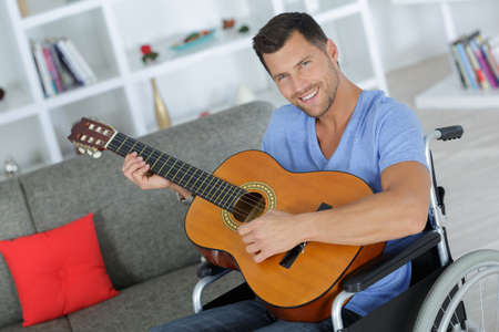 handsome handicapped guitaristの写真素材