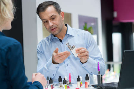 man selling e-cigの写真素材