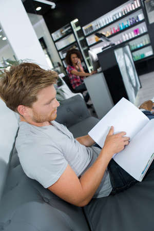 client waiting at hairdressersの写真素材