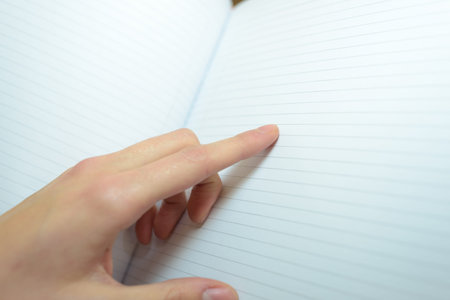 notebook are hand pointing out line