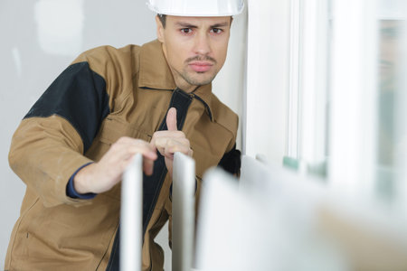 smart concentrated builder indoors at the working area