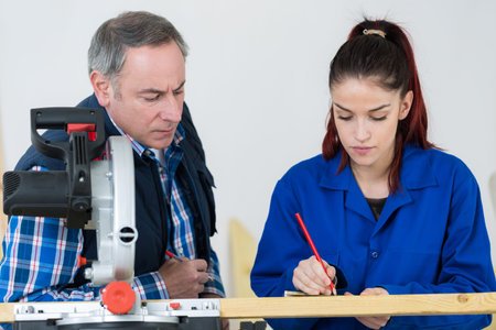 woman as carpenter during apprenticeship lesson