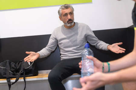 sportsman is upset because he lose the matchの写真素材