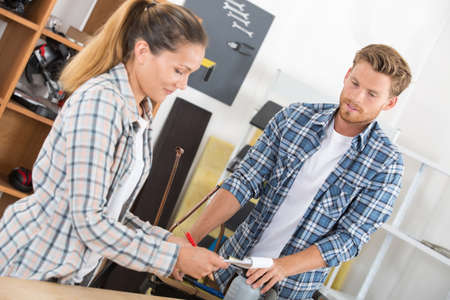 giving the list to the colleagueの写真素材