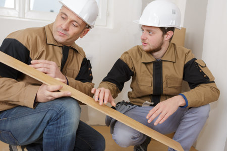 Worker inspecting the material