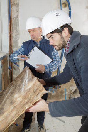 removing the roughcast from the wall