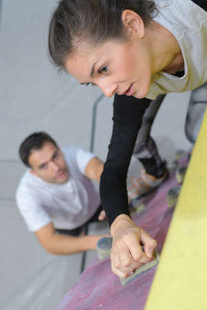 young woman cleaning her roomの写真素材
