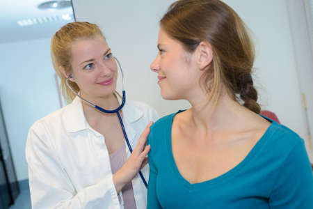 doctor talking to patient usingの写真素材