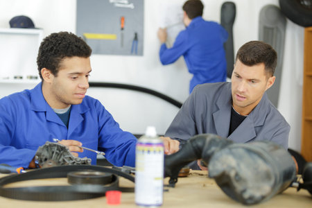 engineering student with teacher