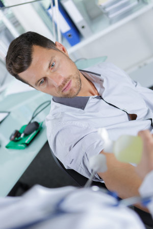 handling down a sampleの写真素材