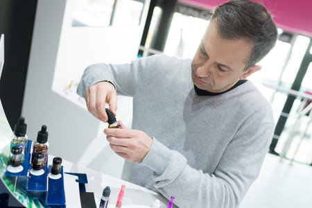 man in vaporizer shopの写真素材