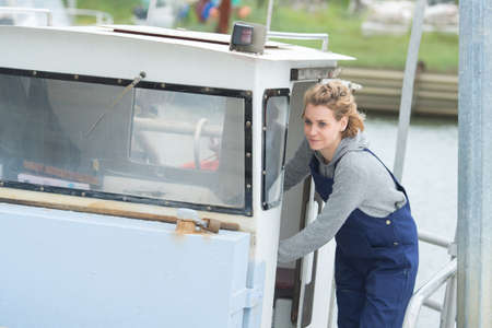 woman worker on a boatの写真素材