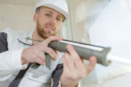 applying epoxy on the edgeの写真素材