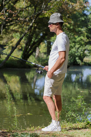 man fishing at the lake