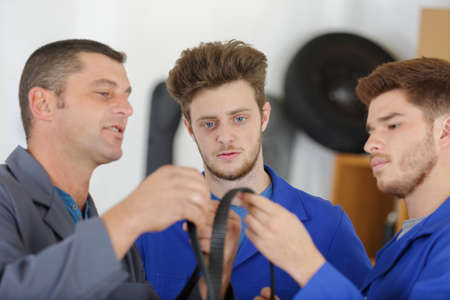 young apprentices in mechanical schoolの写真素材