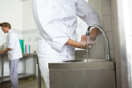 close-up of chef washing his handsの写真素材