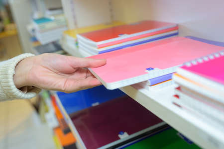 buying a notepadの写真素材