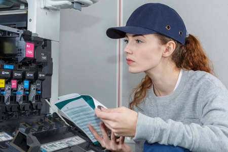 female engineers checking an installation manualの写真素材