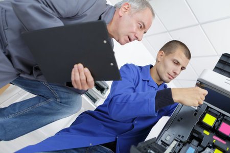manager supervising an apprentices