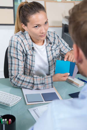 color swatches in a female handの写真素材