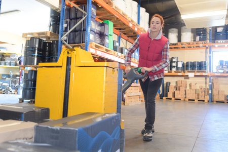 female stacking the product