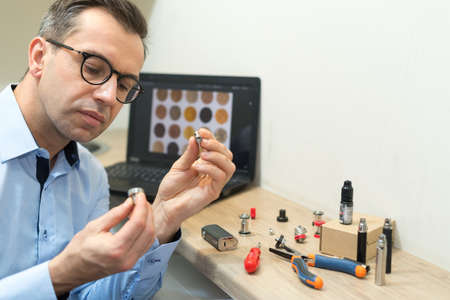 customer choosing e-cigaretteの写真素材