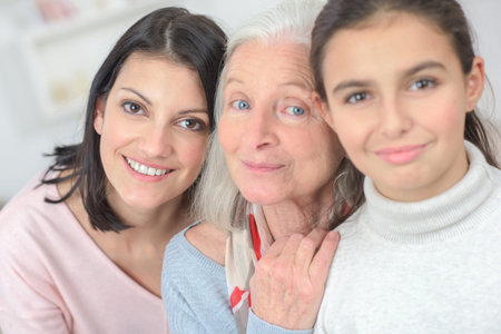 Portrait of two girls with grandmother