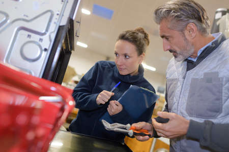 technicians working in an oven factoryの写真素材