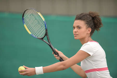 female tennis player on the courtの写真素材
