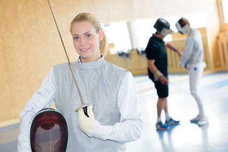 beautiful fencing womanの写真素材