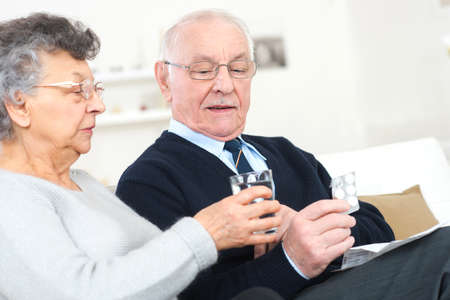 senior take pills medicine healthcareの写真素材