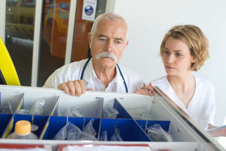 doctors looking for some medical productsの写真素材