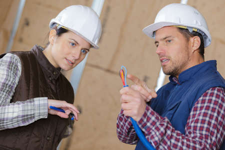 electrician explaining the wire colorsの写真素材