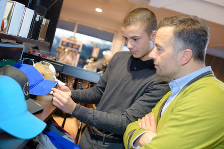 men in golf store