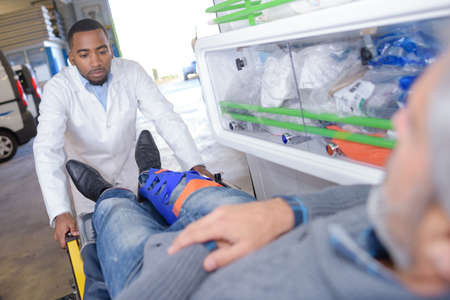 man with broken legの写真素材