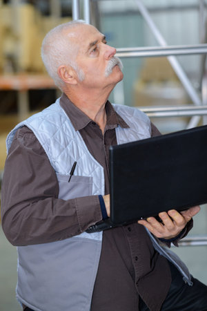 engineering factory worker with clipboardの写真素材