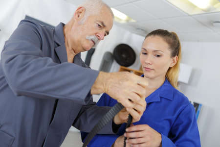 senior engineers with female workerの写真素材