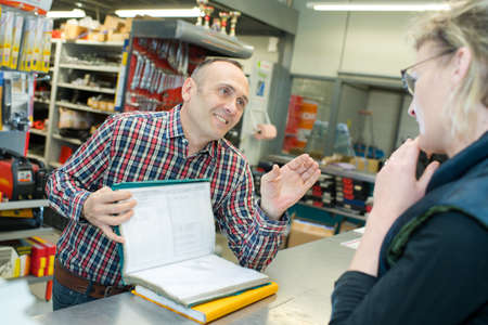 Female customer in a tool storeの写真素材