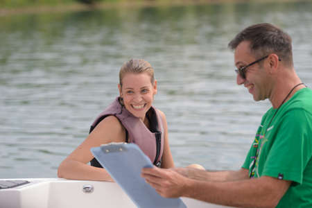 happy female after waterskiingの写真素材
