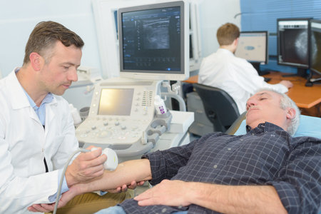 patient having an ultrasound on the arm