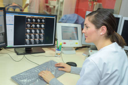 radiologist monitoring the screenの写真素材