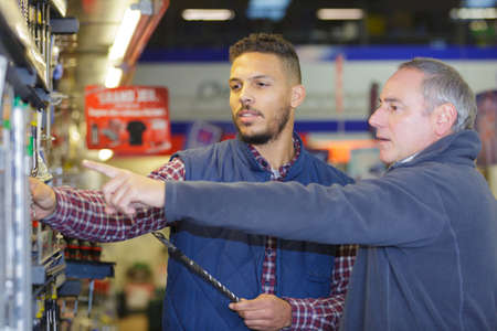 workers checking machineの写真素材