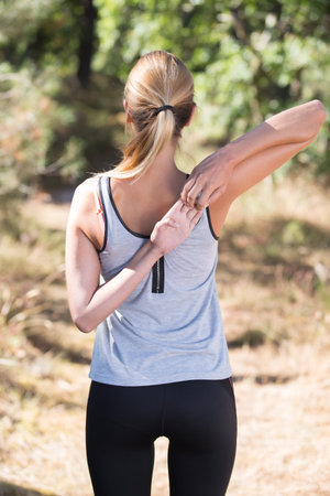 female runner warming up and exercising