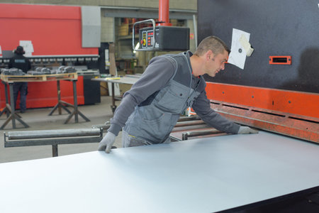 worker working with metal in industryの写真素材