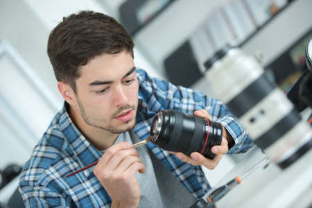 camera lens cleaning with special brushの写真素材